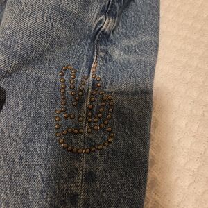 Blue Denim Jeans with Peace Sign Embellishment